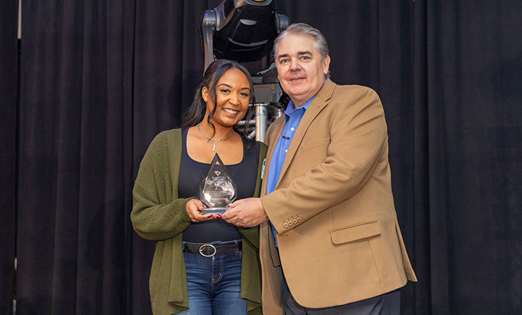 Palmetto Citizens team member being awarded by the CEO.